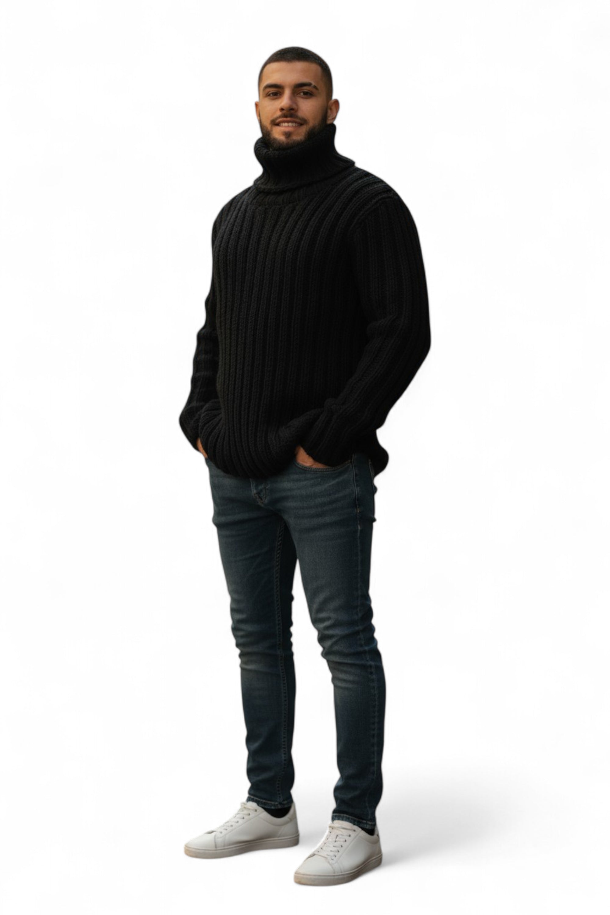 Man wearing a black turtleneck sweater and jeans on a white background
