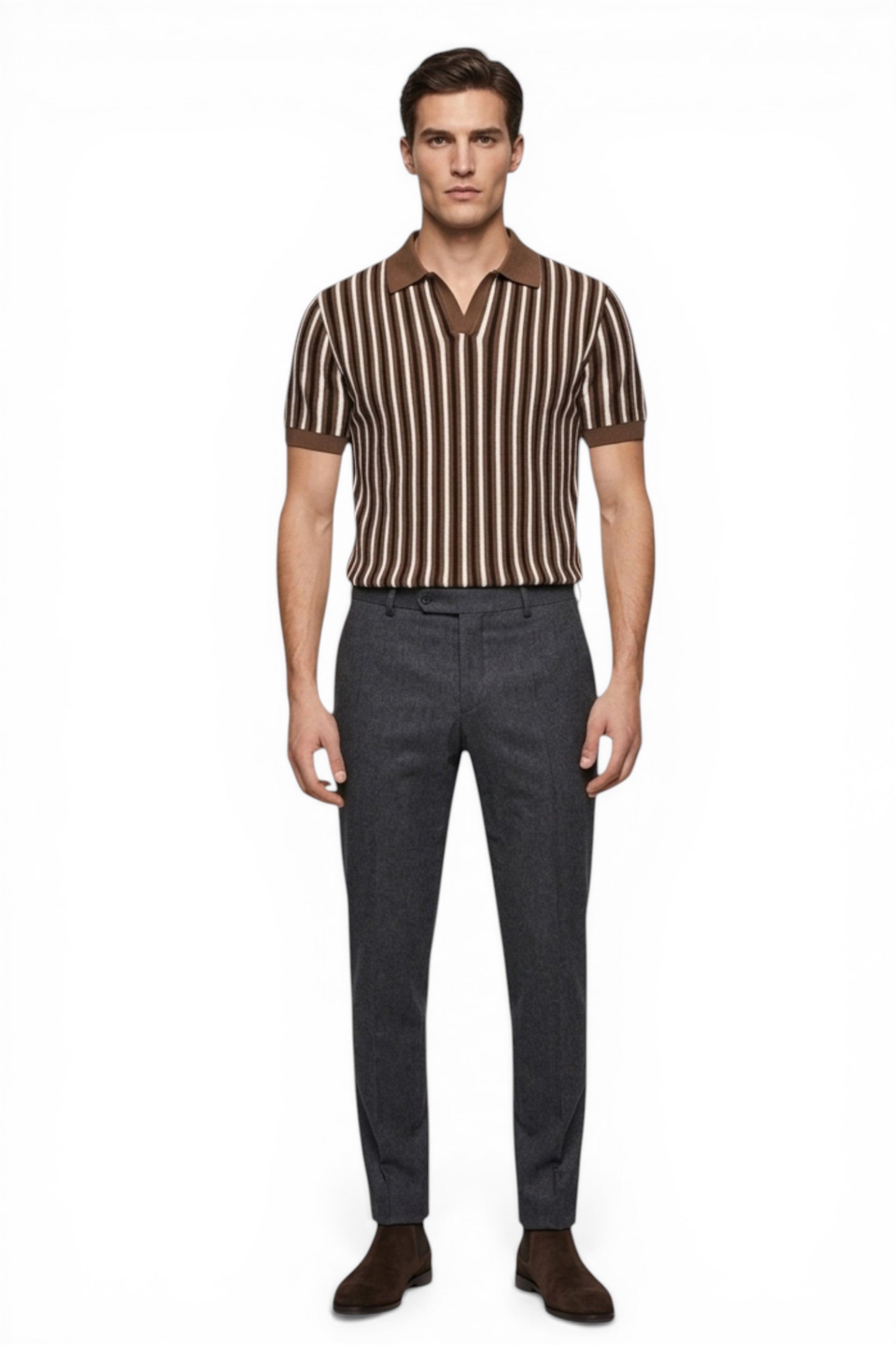 Man wearing a striped shirt and dark pants on a white background