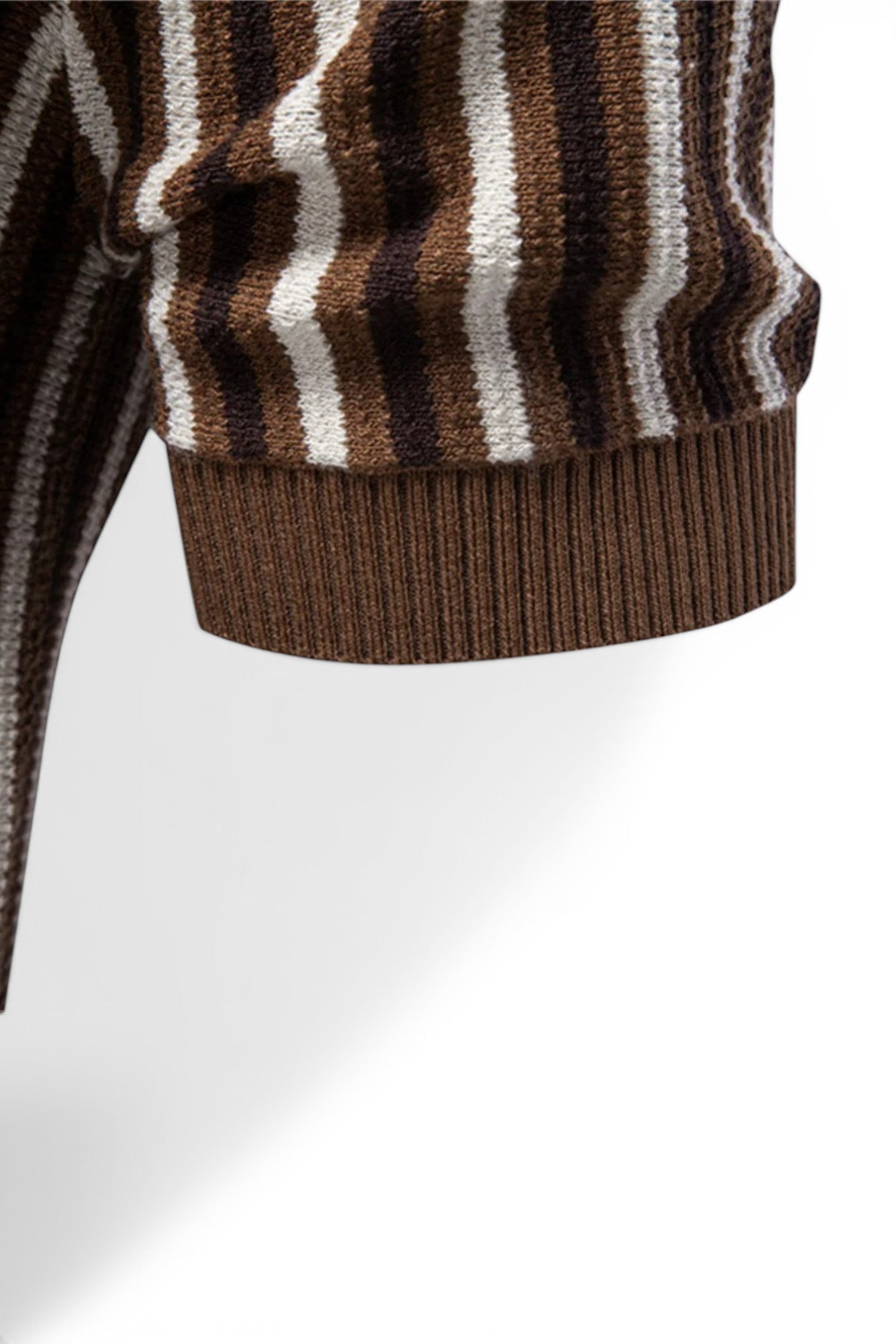 Close-up of a brown and white striped sweater on a white background