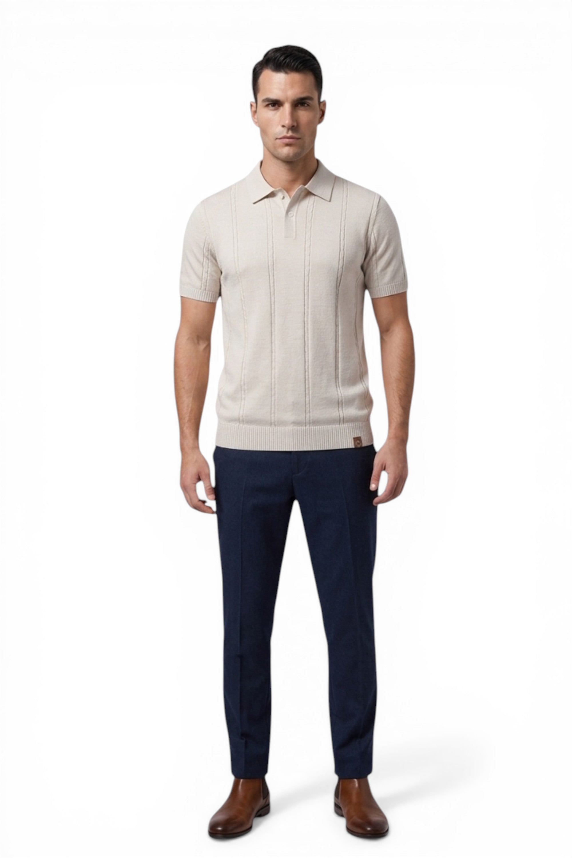 Man wearing a beige short-sleeve knit shirt and navy pants on a white background