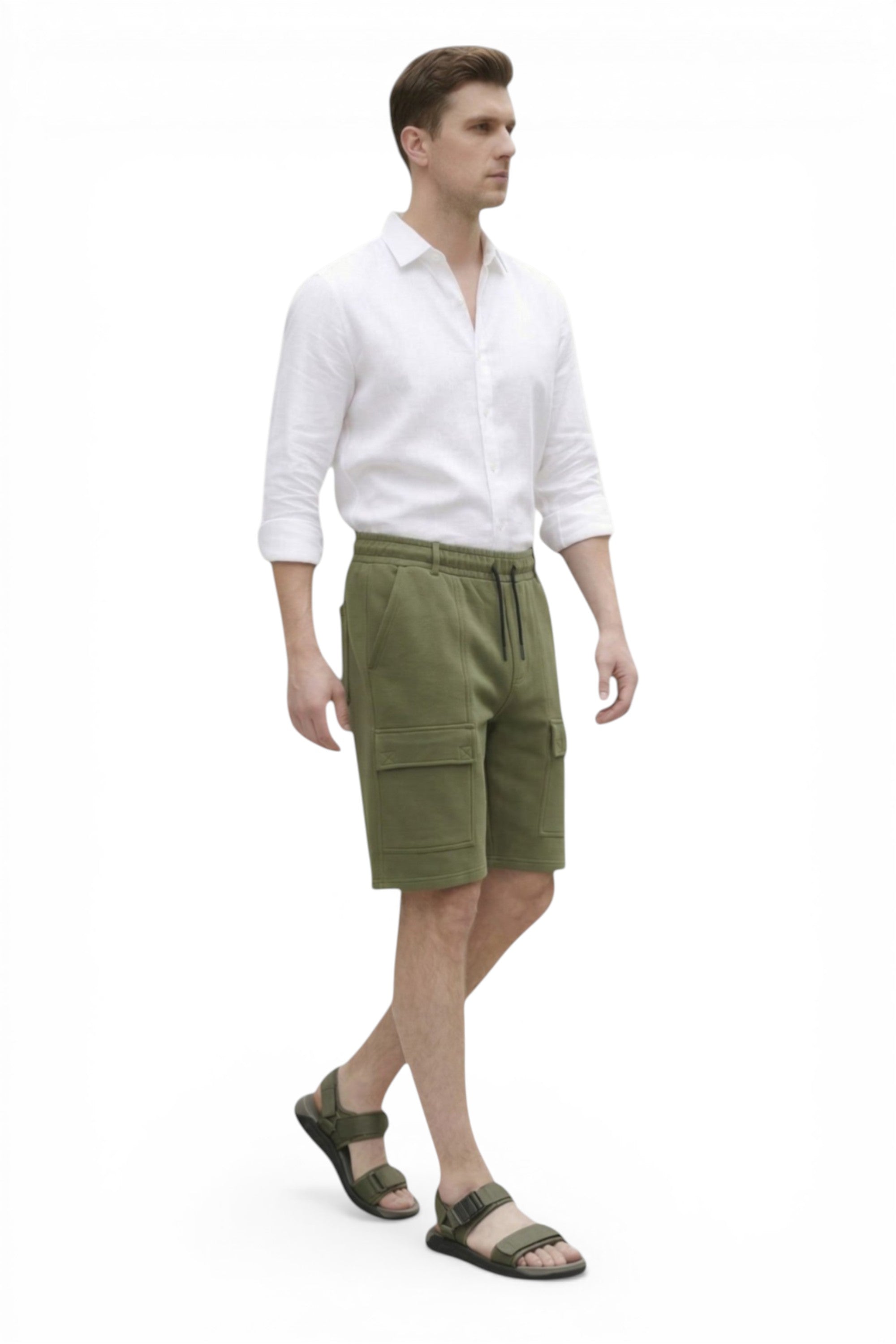 Man wearing a white shirt and green shorts on a white background