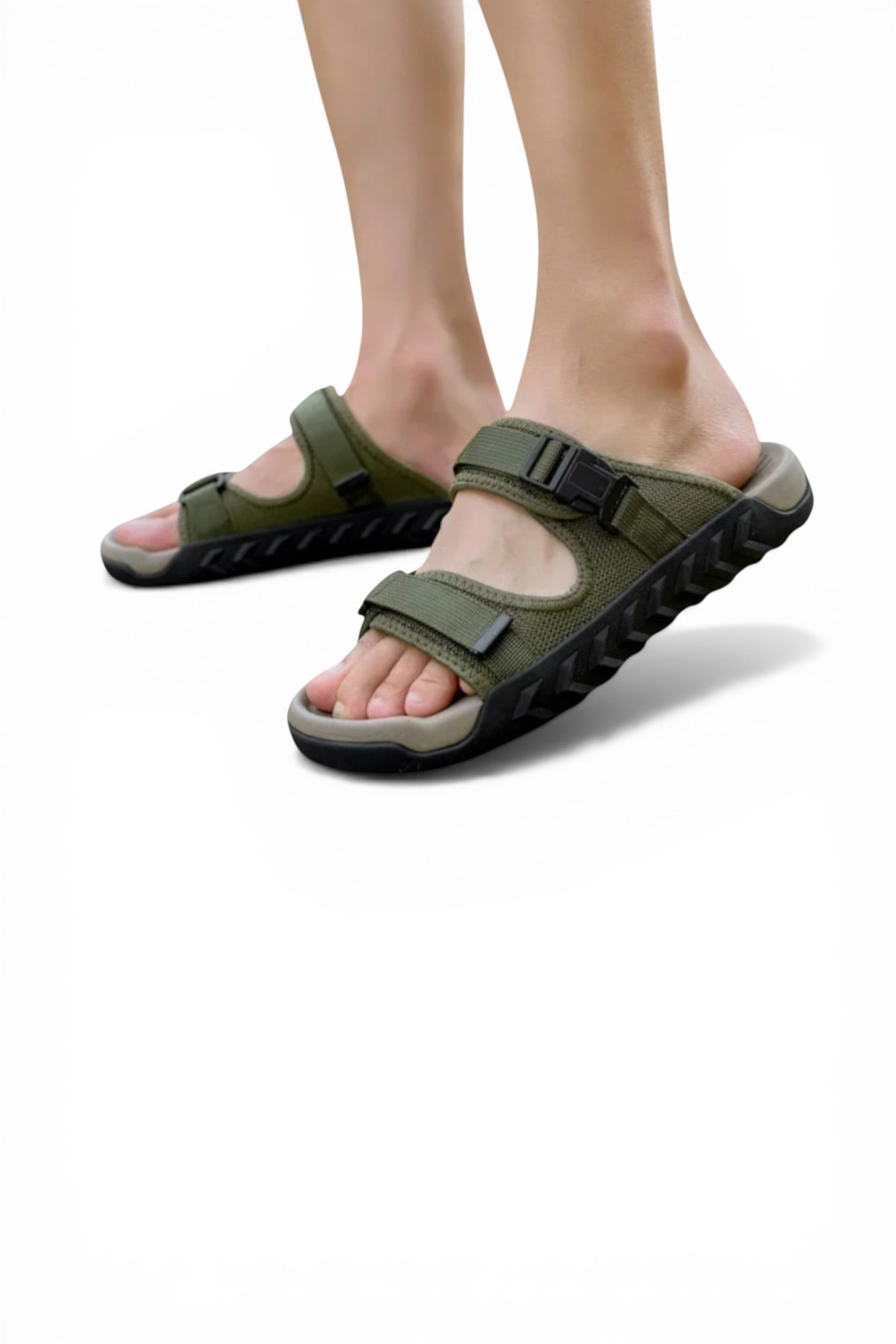 Green sandals worn by a person on a white background