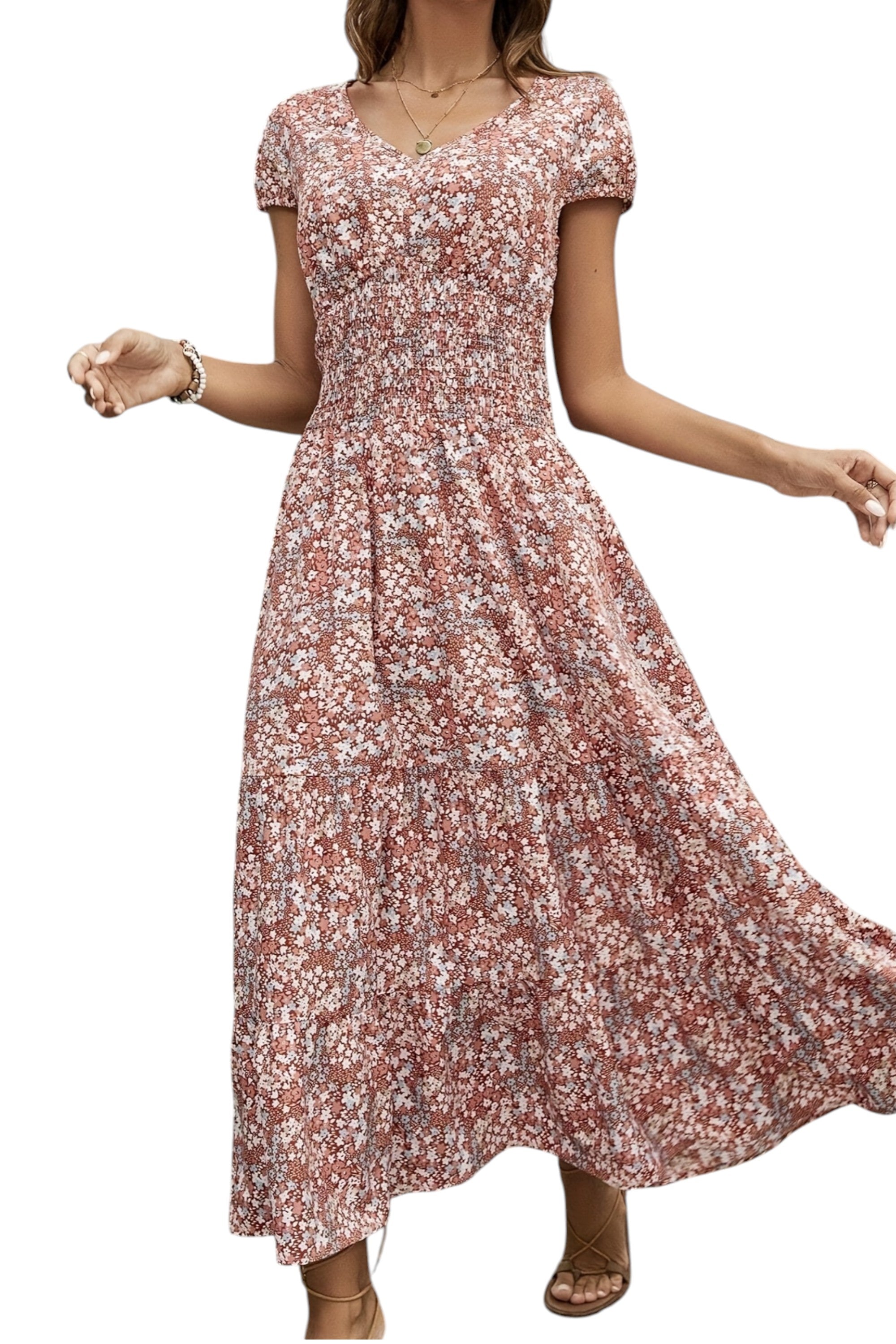 Woman wearing a floral dress on a white background