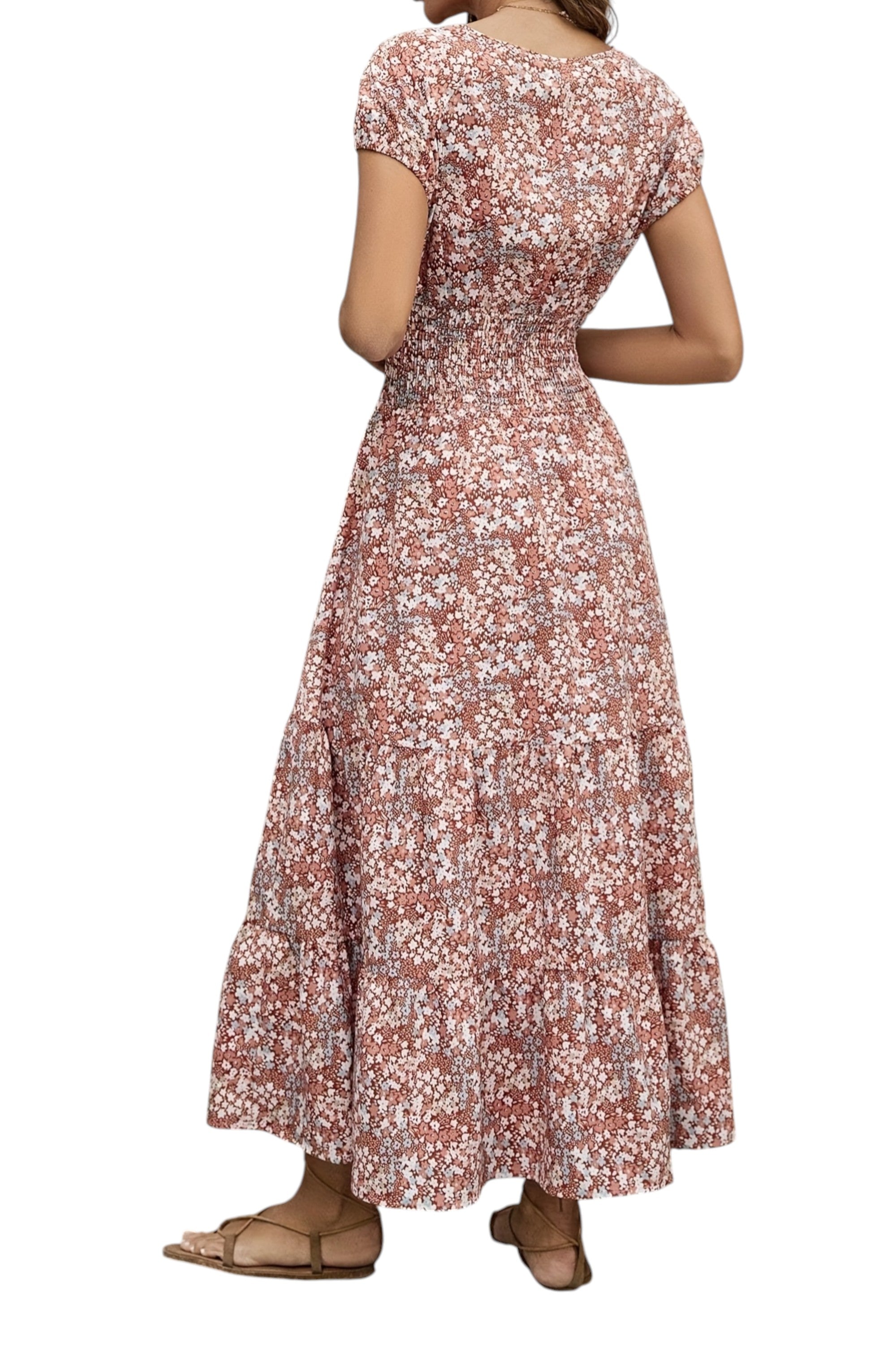 Woman wearing a floral dress on a white background