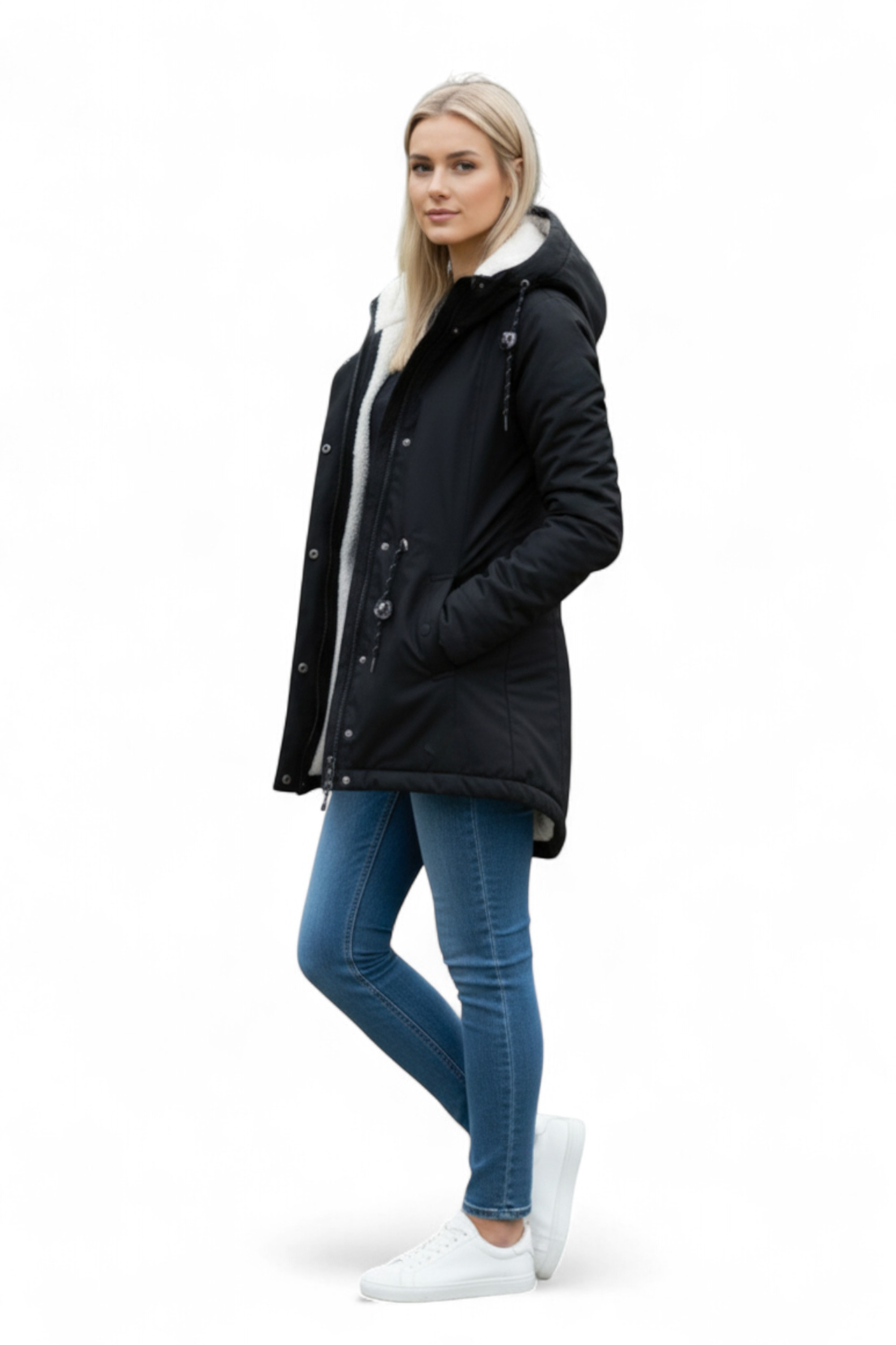 Woman wearing a black coat with a white hood on a white background