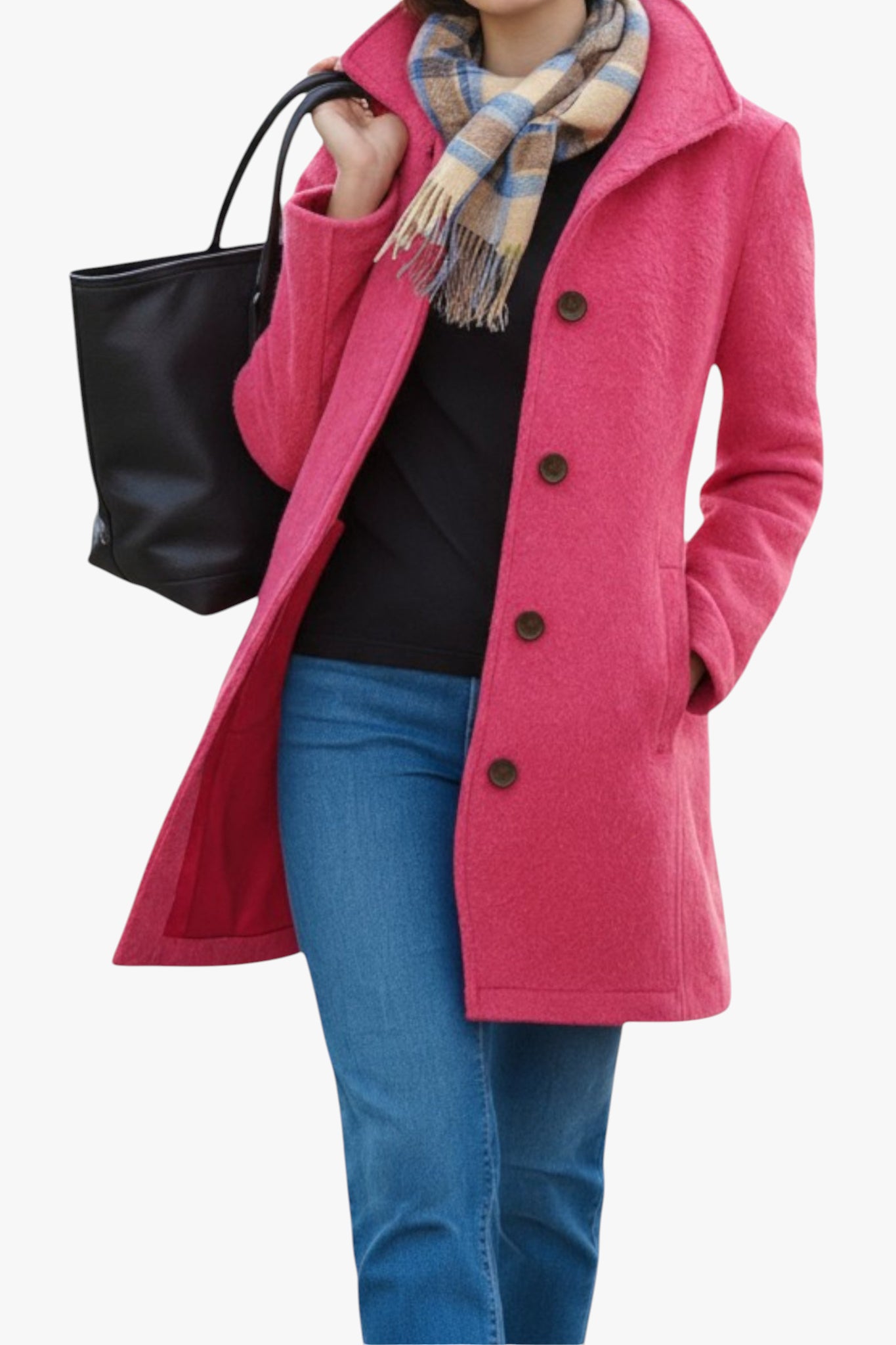 Person wearing a pink coat, black top, blue jeans, and holding a black bag on a white background