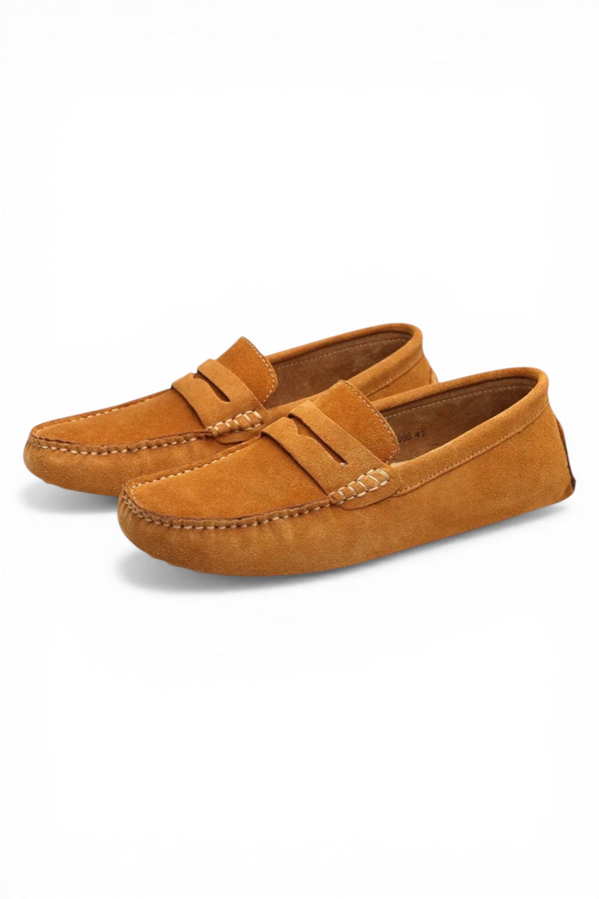 Pair of tan loafers on a white background