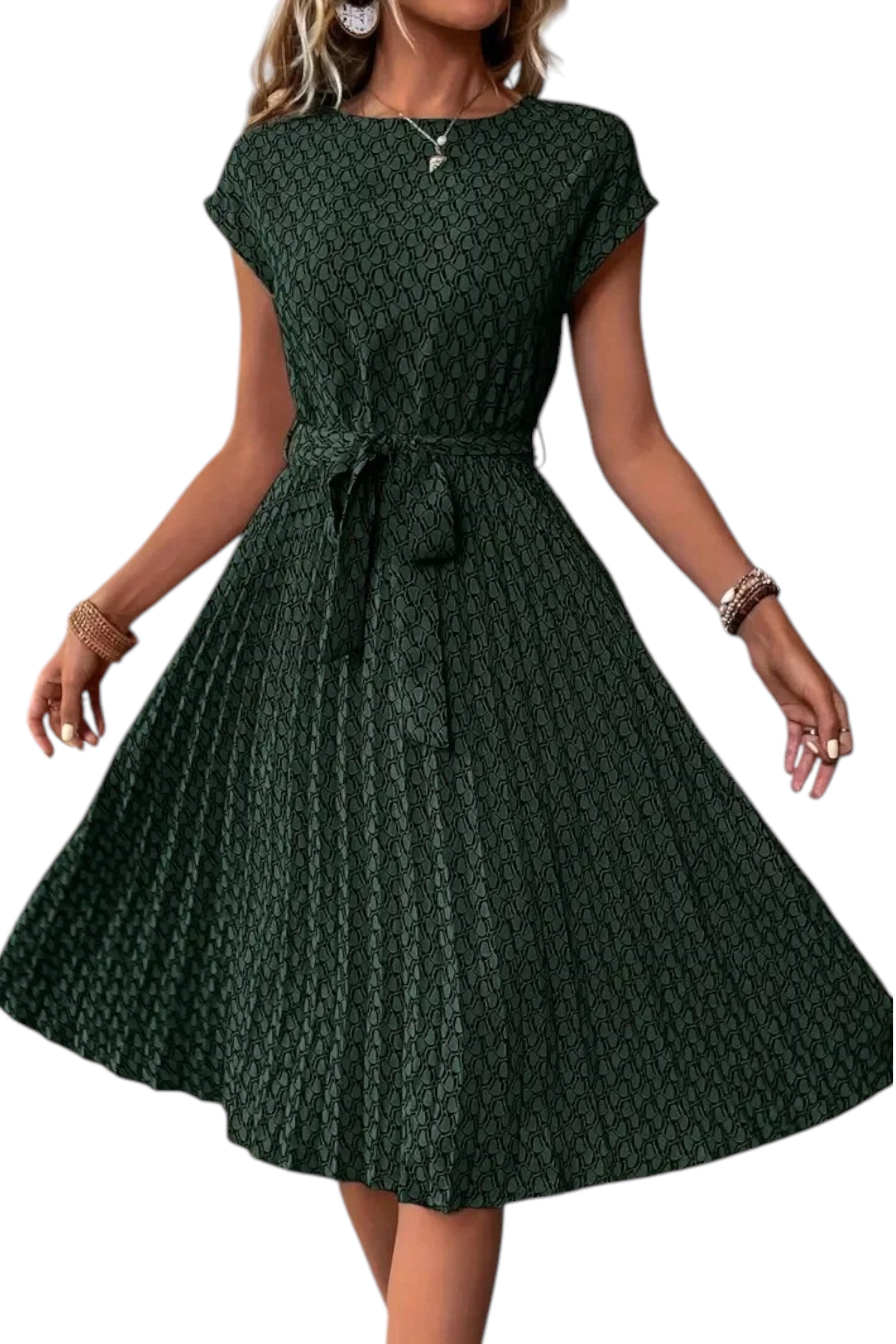 Green patterned dress worn by a model on a white background