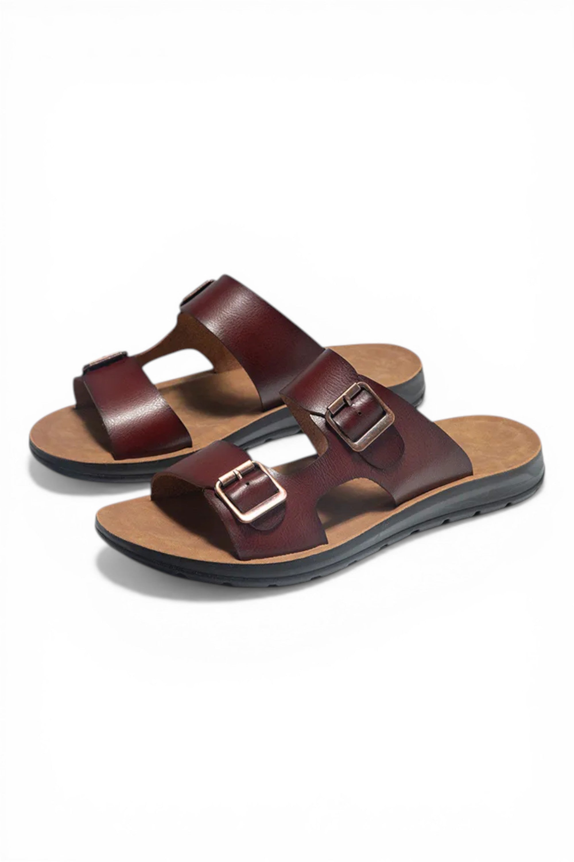 Pair of brown sandals with buckles on a white background