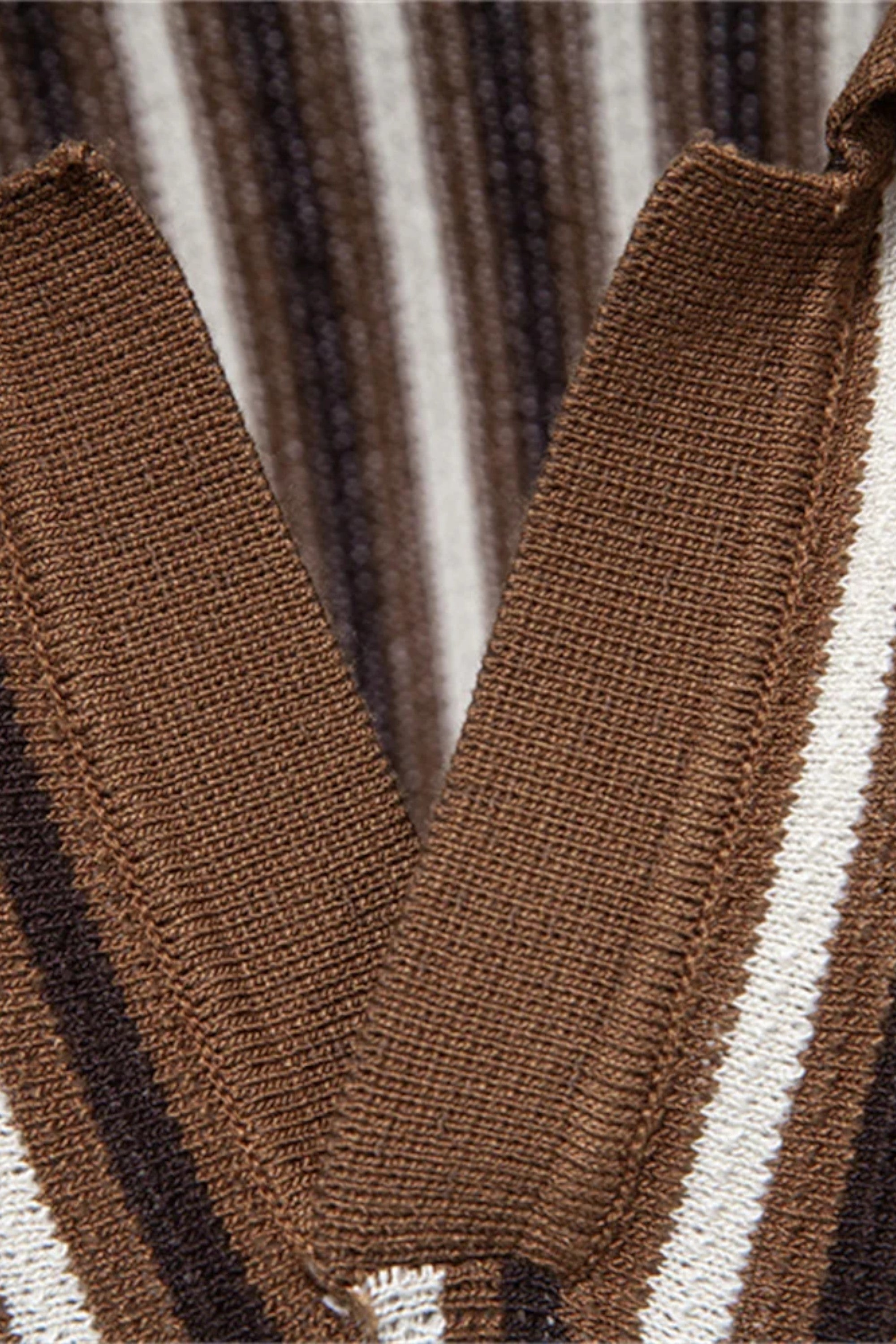 Close-up of a brown and beige striped fabric texture