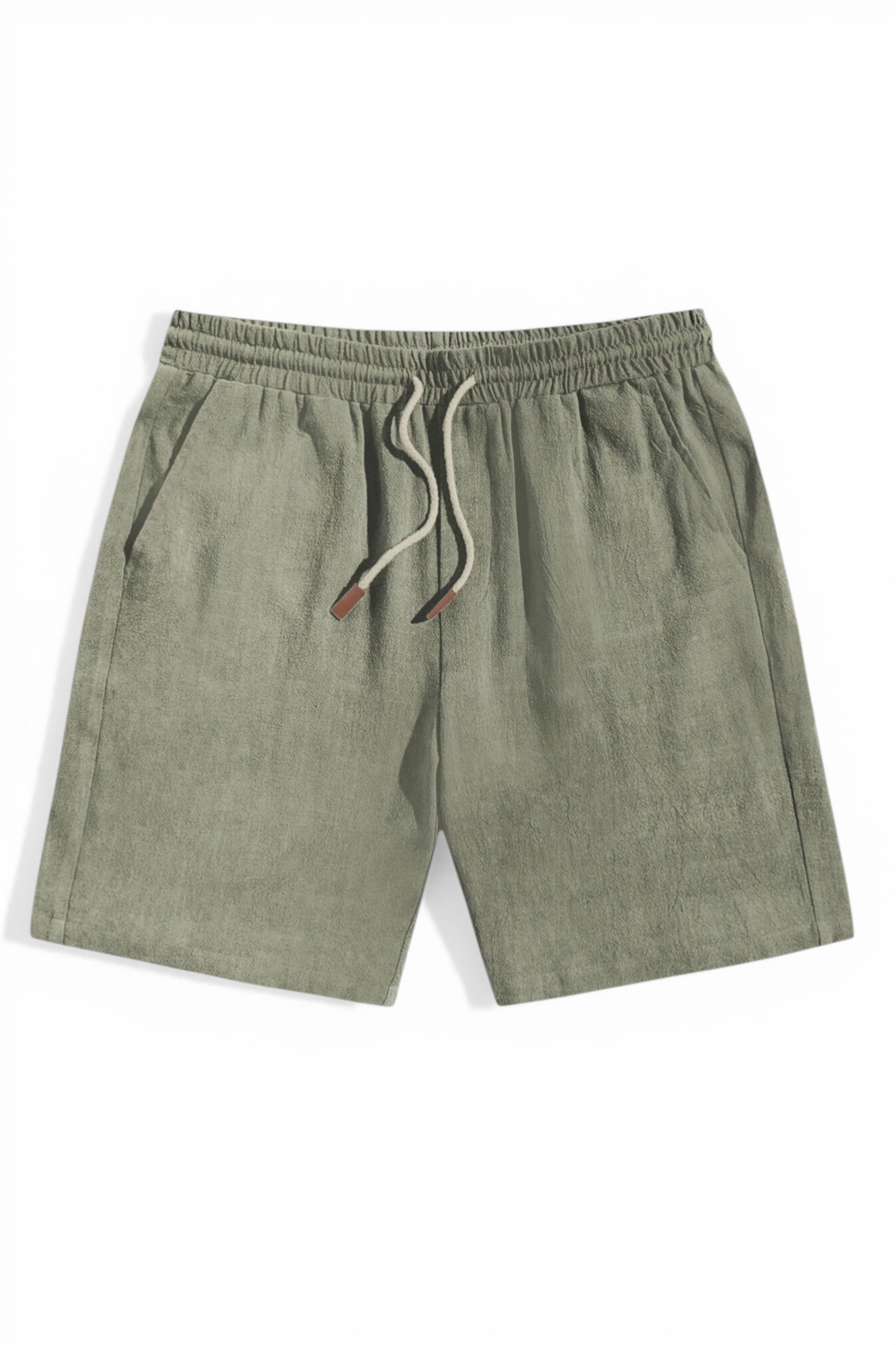 Green shorts with a drawstring on a white background