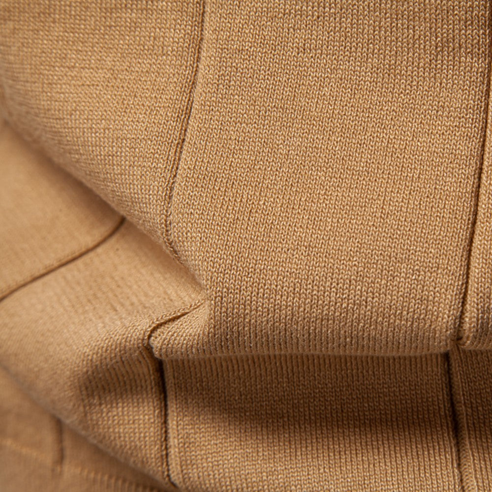 Close-up of brown fabric with a textured pattern
