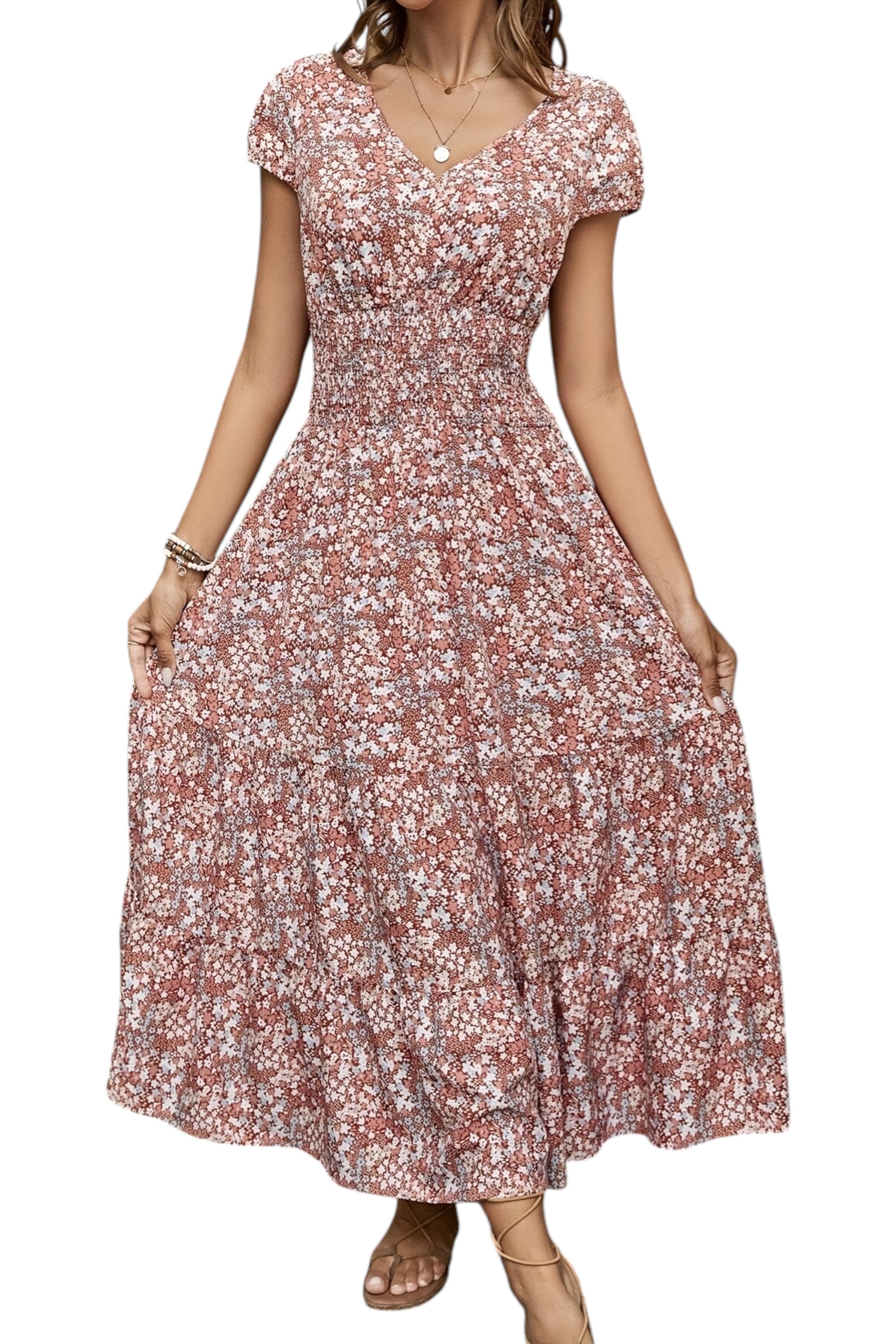 Woman wearing a floral dress on a white background
