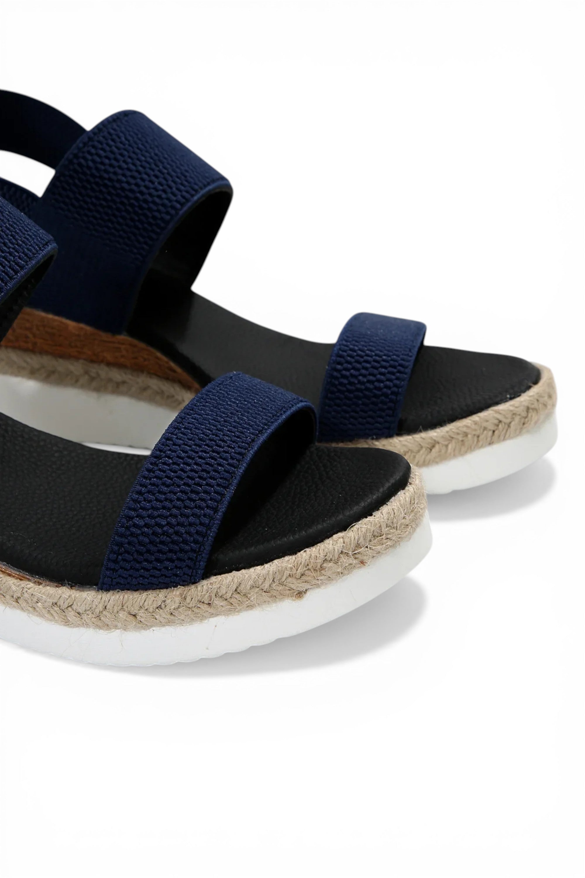 Navy sandals with jute sole on a white background