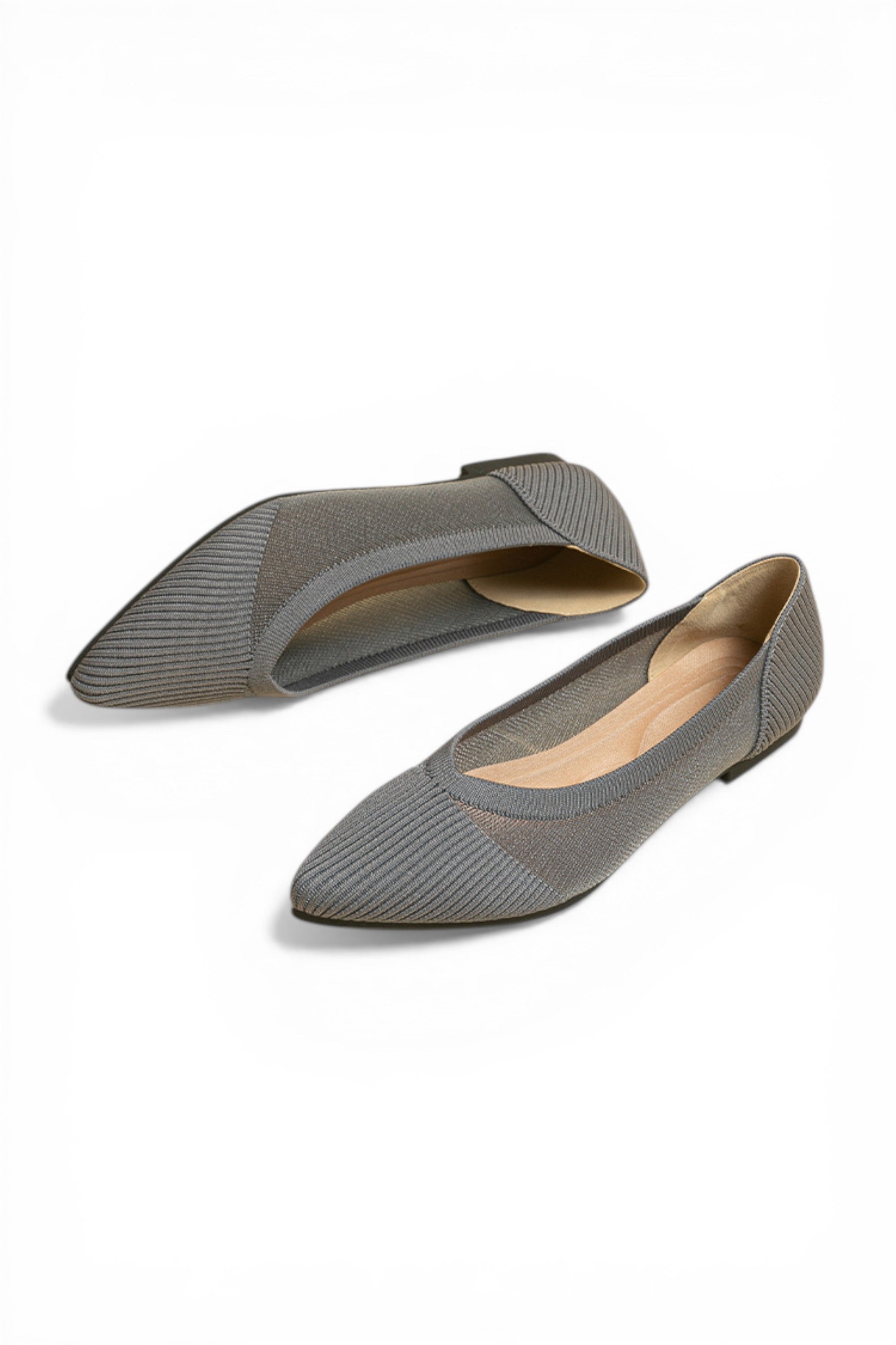 Pair of gray pointed-toe flats on a white background