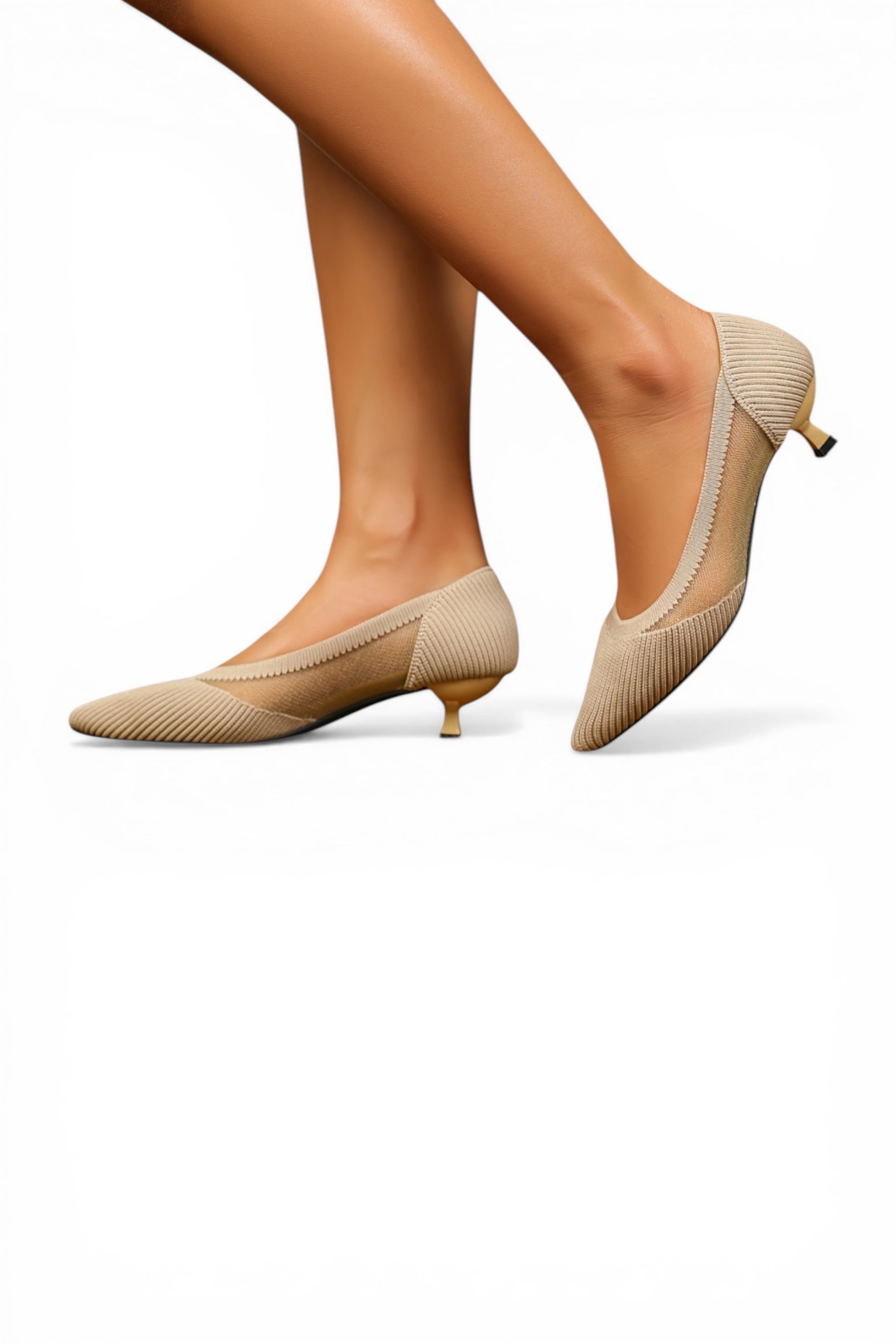 Beige high-heeled shoes worn by a person on a white background