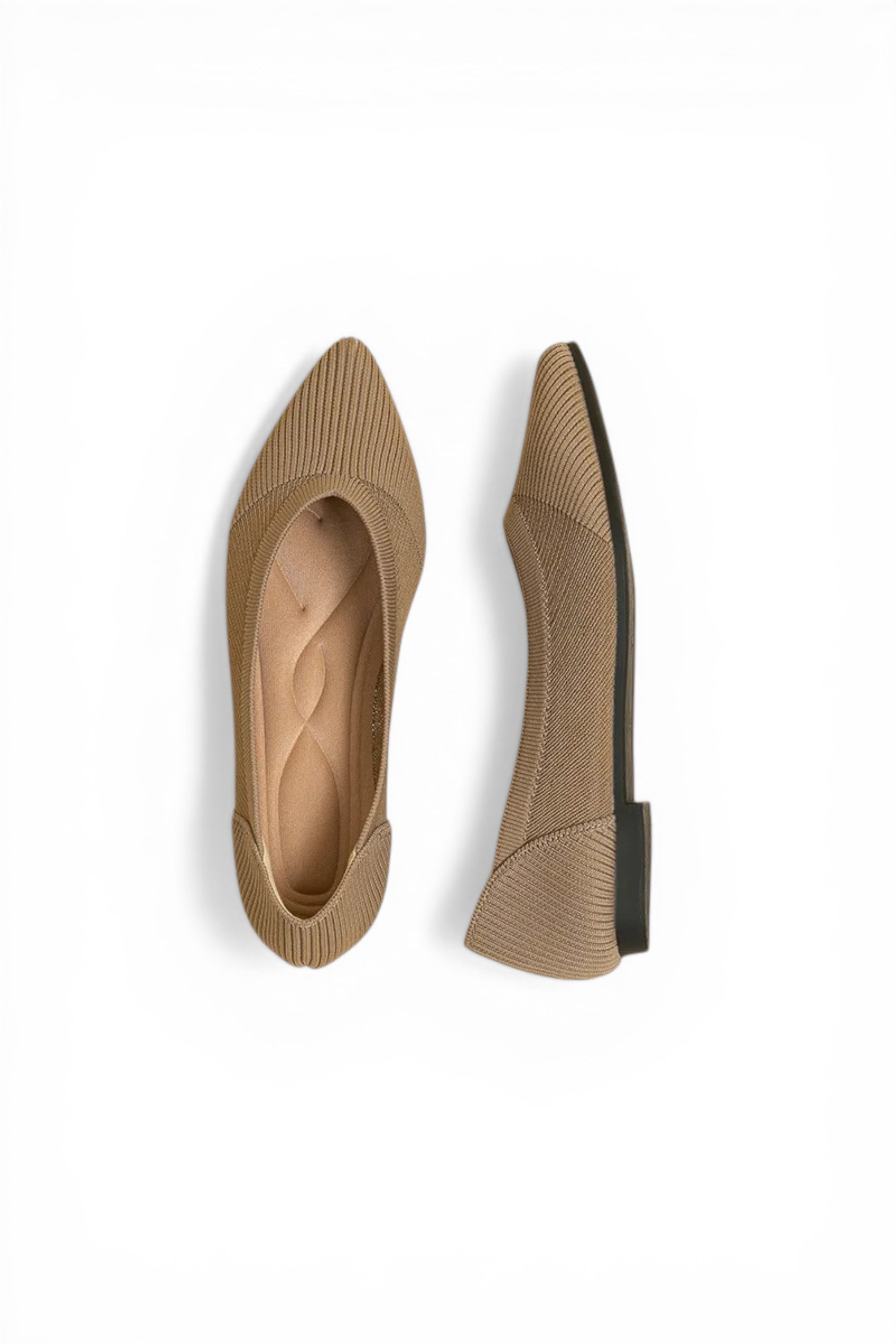 Pair of beige pointed-toe shoes on a white background