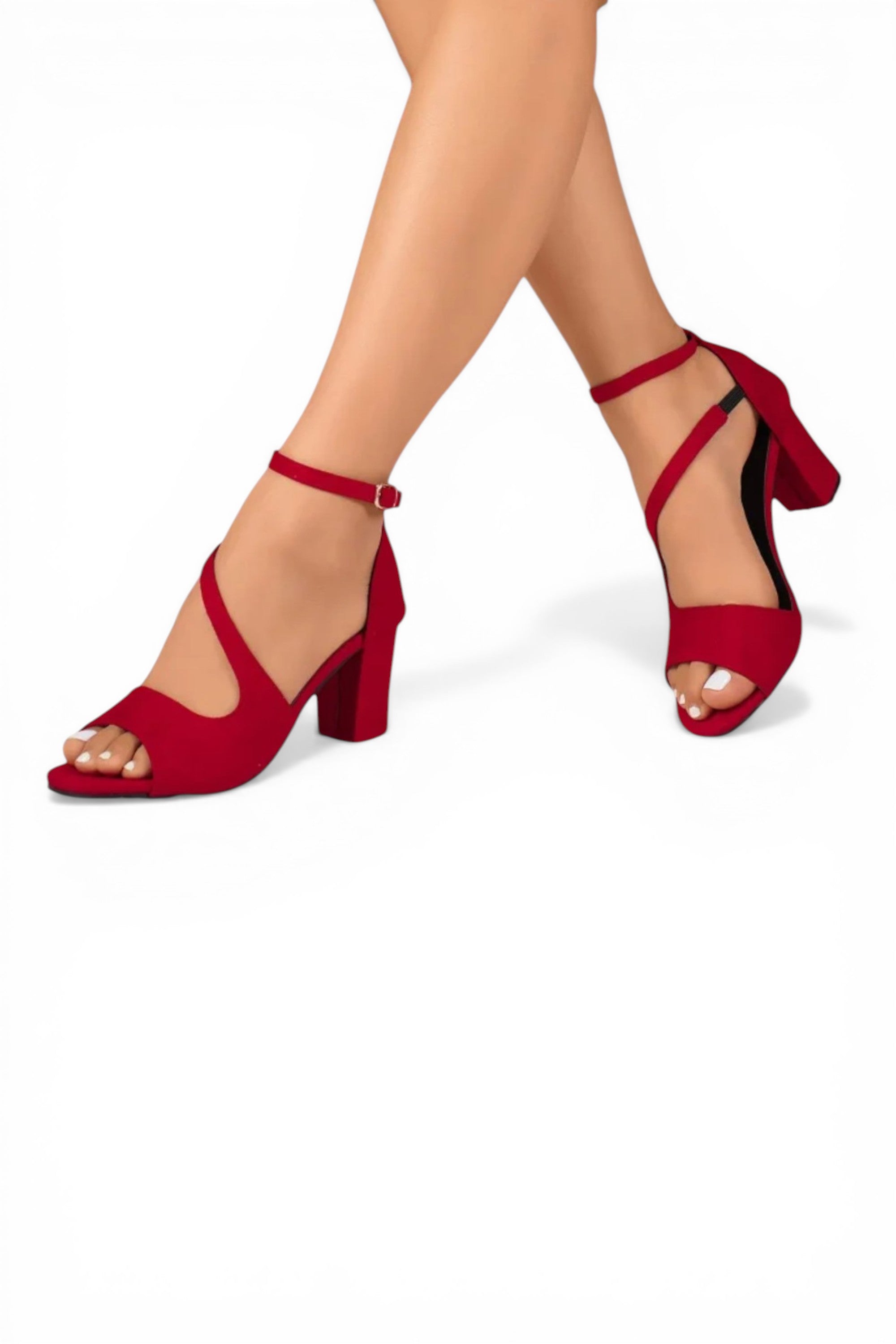 Red high-heeled shoes worn by a person on a white background