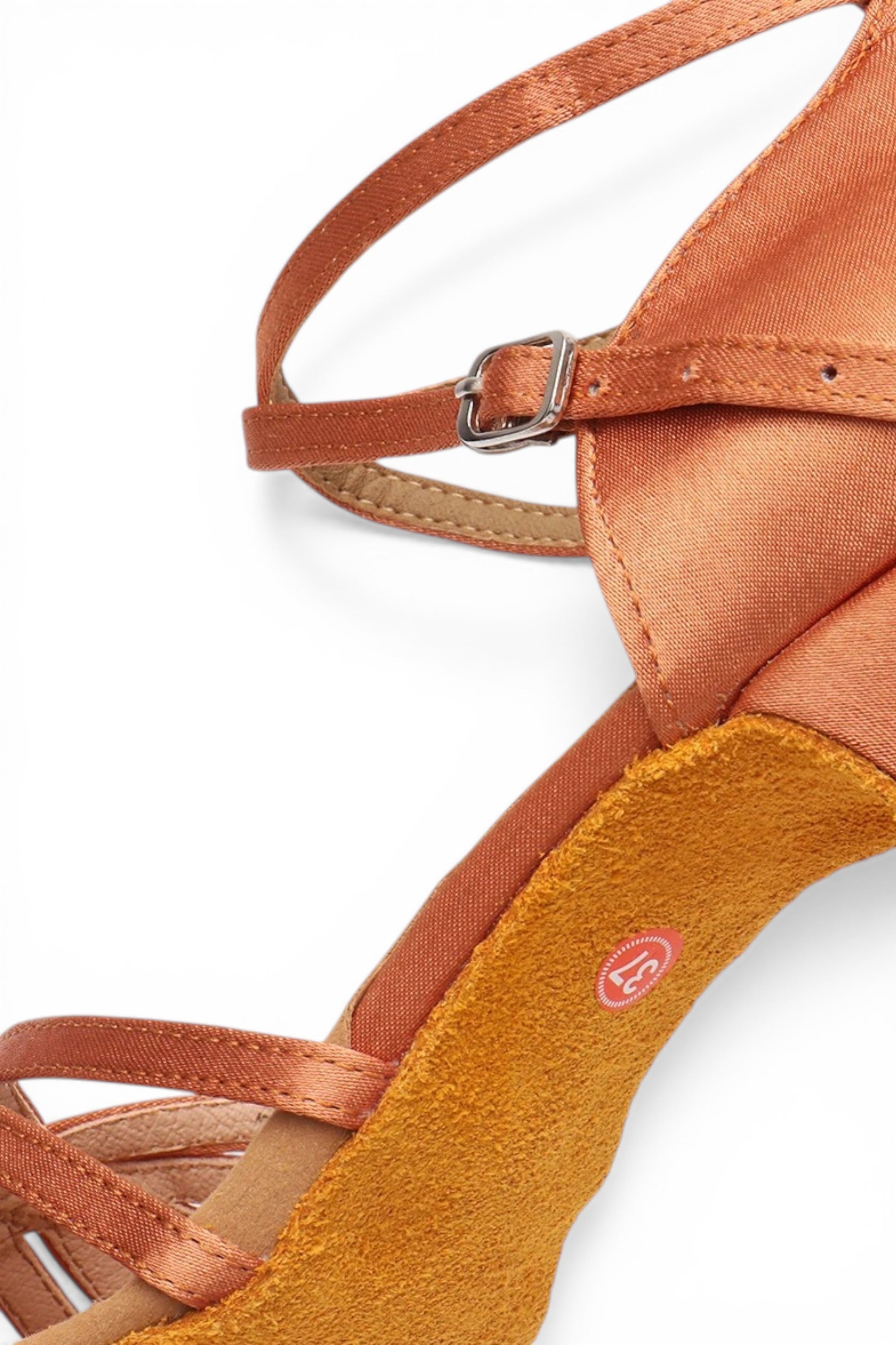 Close-up of a sandal with a tan strap and yellow sole on a white background