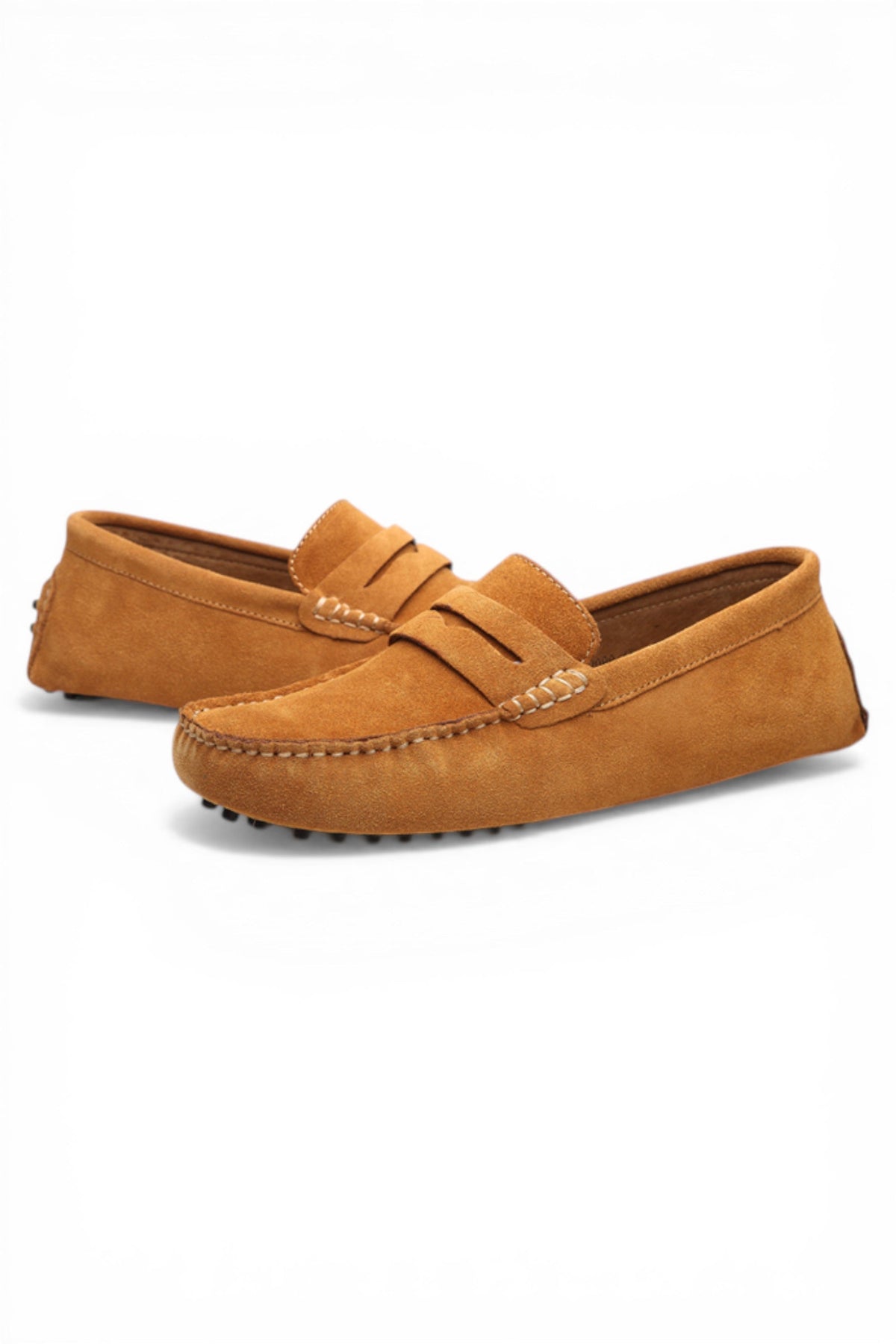 Pair of brown suede loafers on a white background