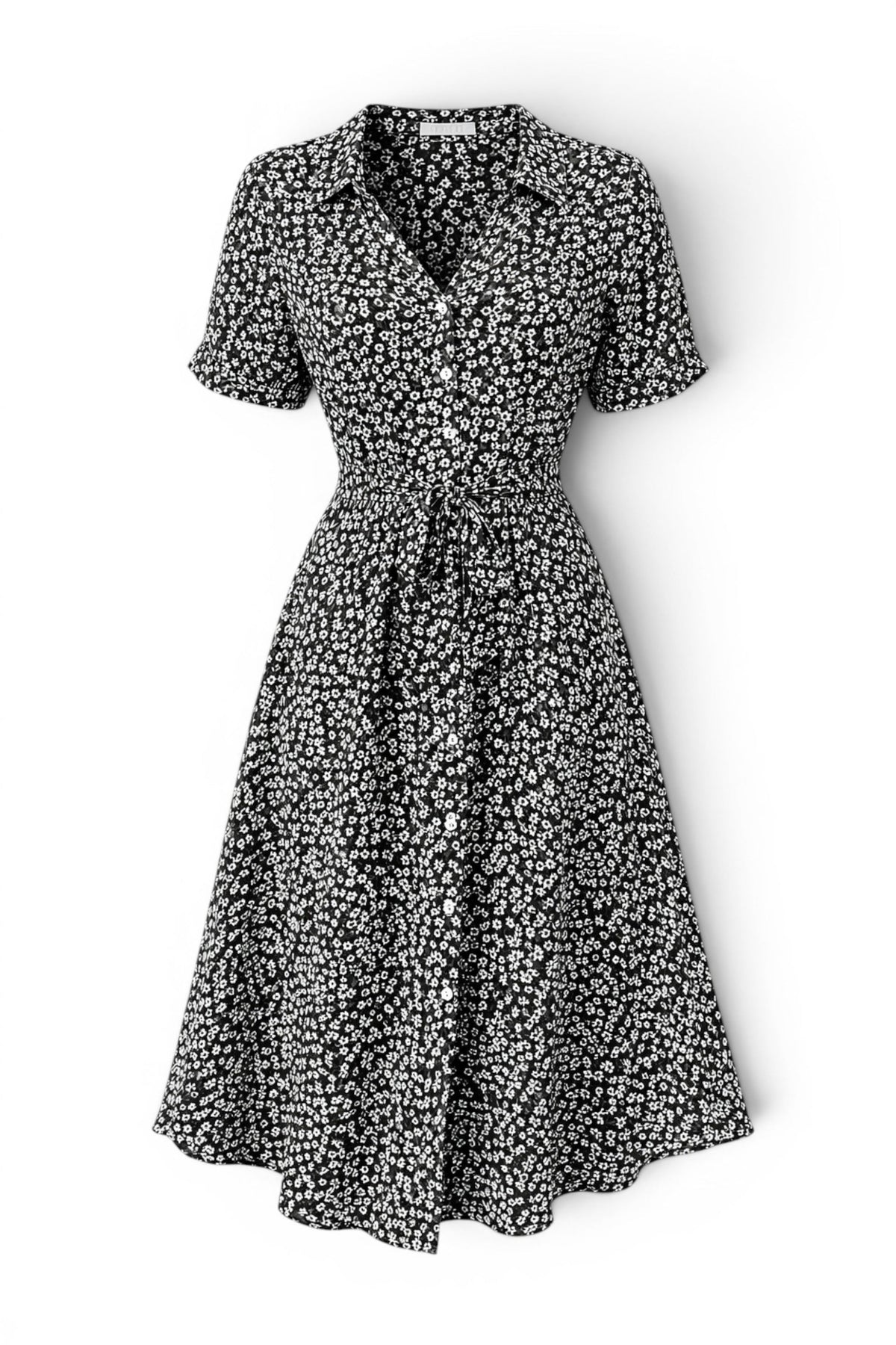 Black and white floral dress on a white background
