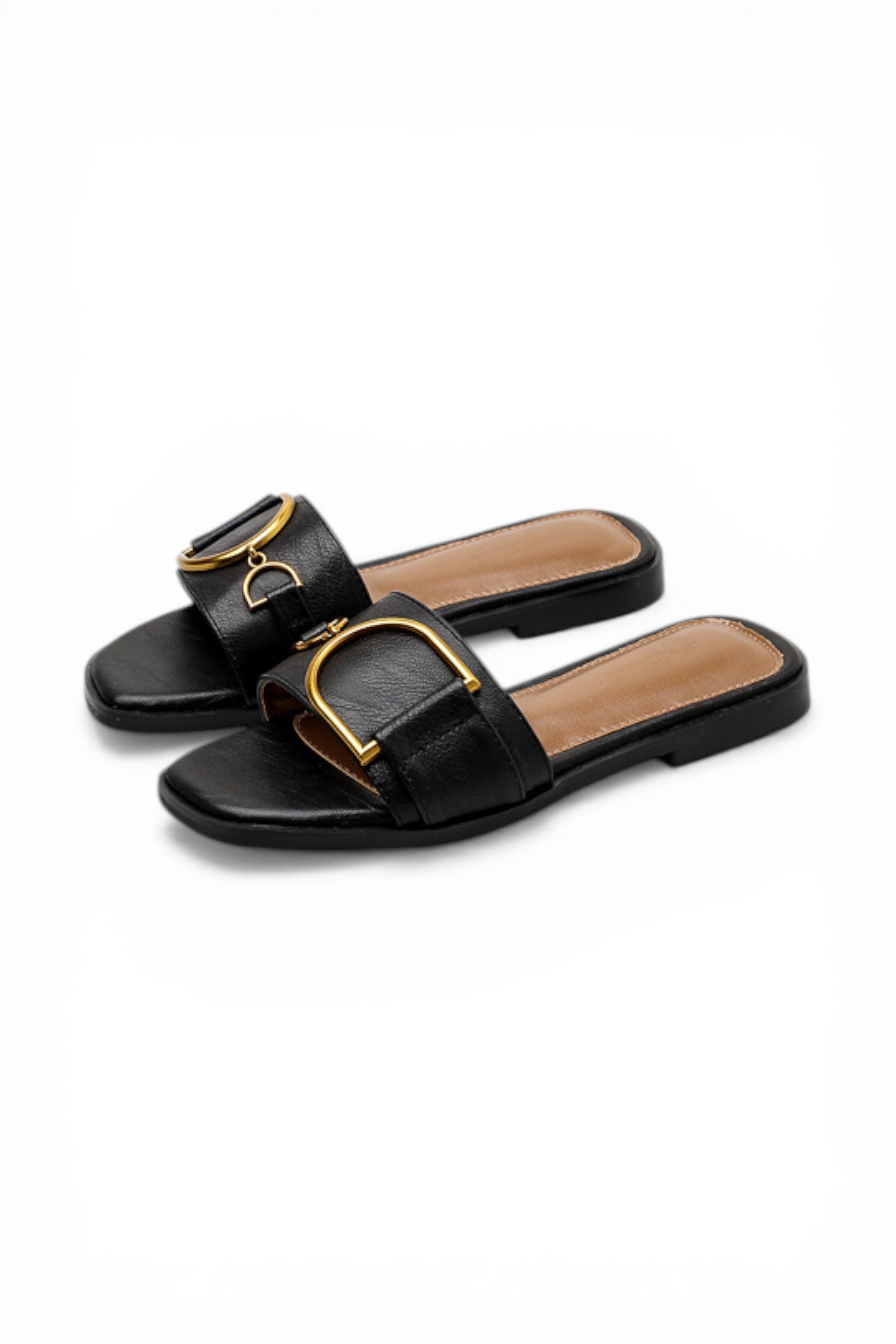 Black sandals with gold buckles on a white background
